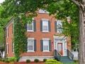 This early Federal brick house (c. 1823) has 8 fireplaces, 2 with double cranes The lintels and sills are grey stone, probably from a local quarry.