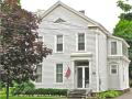 Dating to 1840, this house features two of house joiner Chaffy's trademarks: the triangular fan window and a rectangular transom over the front doors.