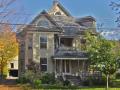 This Queen Anne Victorian, built c. 1885, has a three-story barn. Although it appears to be another of the many two-story Victorian era carriage houses found in Homer, this one has a basement level that was used to stable horses.