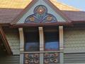 A detail of the trim on Archimedes Russell�s �Sunflower House�, shown above. The house is painted with 14 colors appropriate to the era.